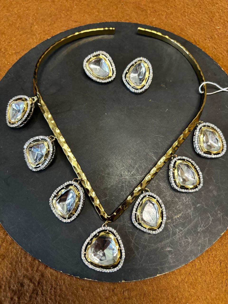 Tarakshi Kundan Halo Set